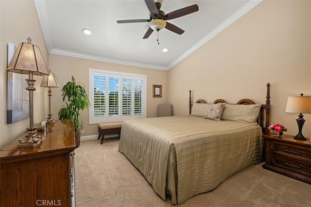 bedroom with ceiling fan, baseboards, crown molding, and light colored carpet