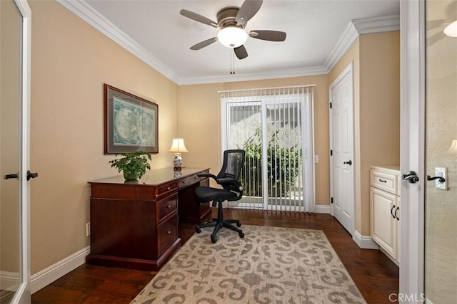 office area featuring ornamental molding, dark wood-type flooring, a ceiling fan, and baseboards