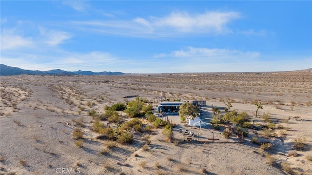 exterior space featuring a desert view