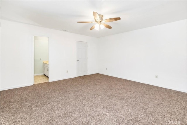 42397 Santiago Dr, Hemet, CA 92544 - unfurnished room featuring ceiling fan, light carpet, visible vents, and baseboards