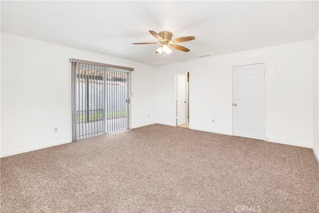 42397 Santiago Dr, Hemet, CA 92544 - carpeted spare room with ceiling fan and baseboards