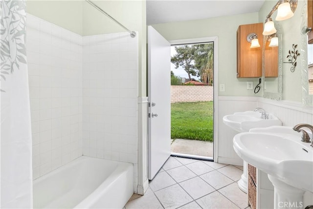 42397 Santiago Dr, Hemet, CA 92544 - full bathroom featuring wainscoting, tile patterned floors, shower / bath combo, and a sink