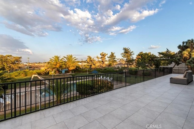 view of patio featuring fence