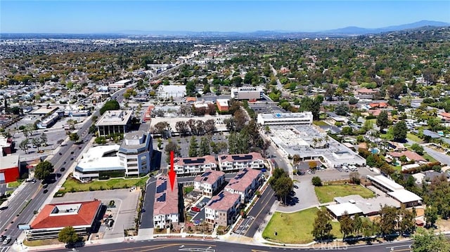 drone / aerial view featuring a mountain view