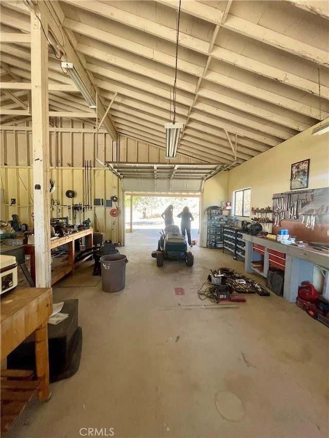 garage with a workshop area