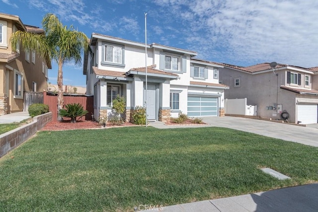 view of front of property featuring a garage, concrete driveway, stucco siding, fence, and a front yard