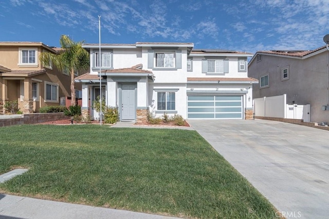 view of front of house featuring a garage, solar panels, fence, stucco siding, and a front yard