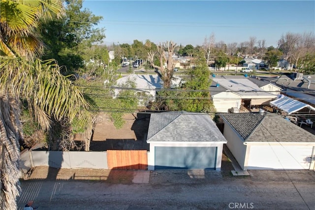 birds eye view of property with a residential view