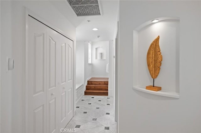 hallway featuring recessed lighting and visible vents