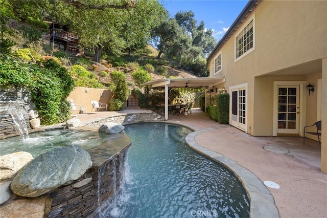 view of pool with a patio area and a fenced in pool