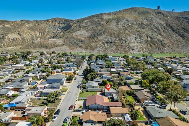 bird's eye view featuring a mountain view and a residential view