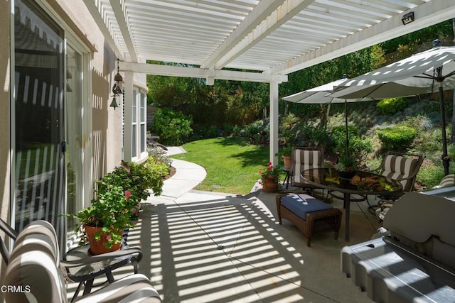 view of patio with a pergola and outdoor dining space