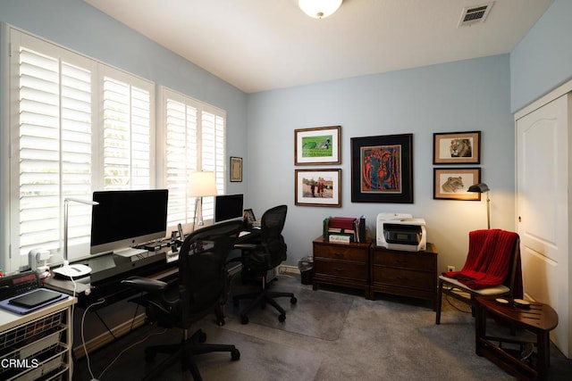 office featuring carpet floors and visible vents