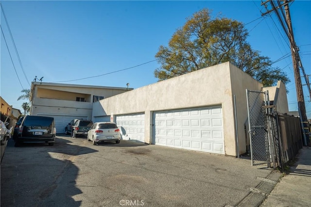 garage featuring fence