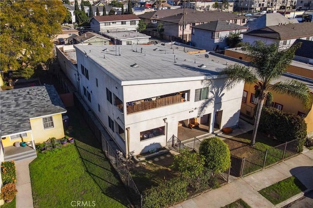 birds eye view of property with a residential view