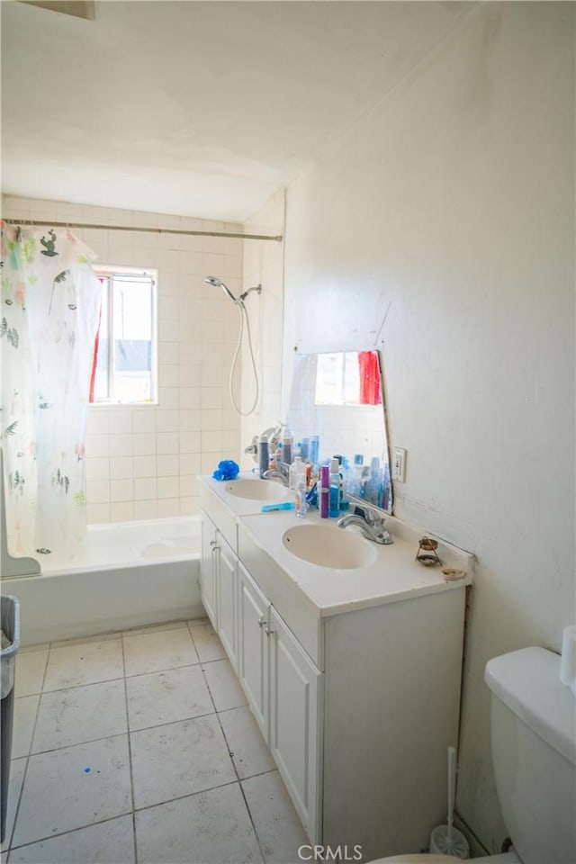 full bath featuring double vanity, a sink, toilet, and shower / bathtub combination with curtain