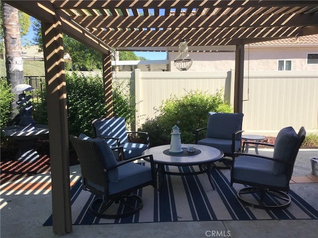 view of patio featuring a fenced backyard and a pergola