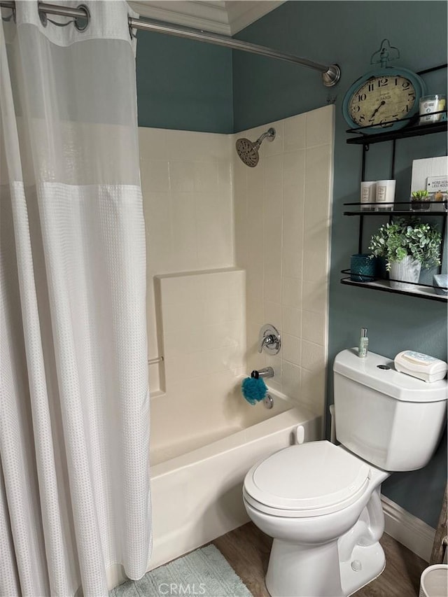 full bath with shower / bath combination with curtain, toilet, and wood finished floors