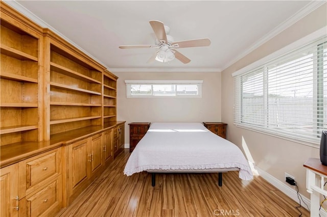 bedroom featuring multiple windows, wood finished floors, and crown molding