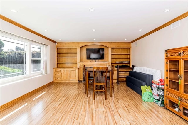 living area with ornamental molding, wood finished floors, visible vents, and recessed lighting