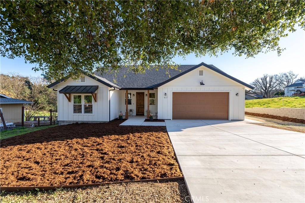 417 Cayucos Ave, Templeton, CA 93465 - modern farmhouse featuring board and batten siding, concrete driveway, and an attached garage