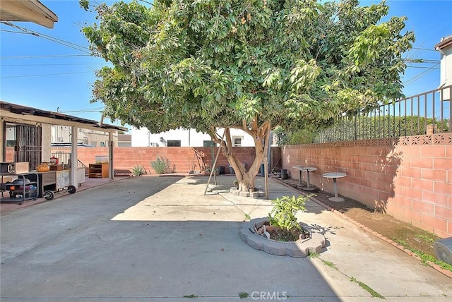 view of patio featuring a fenced backyard