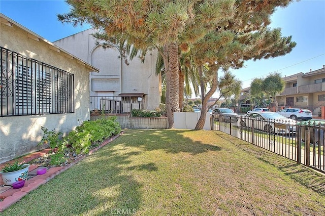 view of yard featuring fence