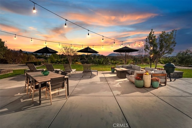 view of patio / terrace with outdoor dining area, grilling area, and an outdoor hangout area