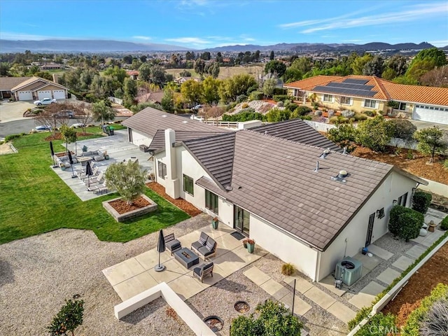 birds eye view of property featuring a residential view and a mountain view