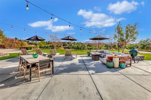 view of patio featuring outdoor dining area and an outdoor living space