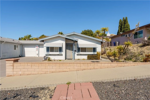 3648 Mira Pacific Dr, Oceanside, CA 92056 - view of front facade with a garage, driveway, and stucco siding
