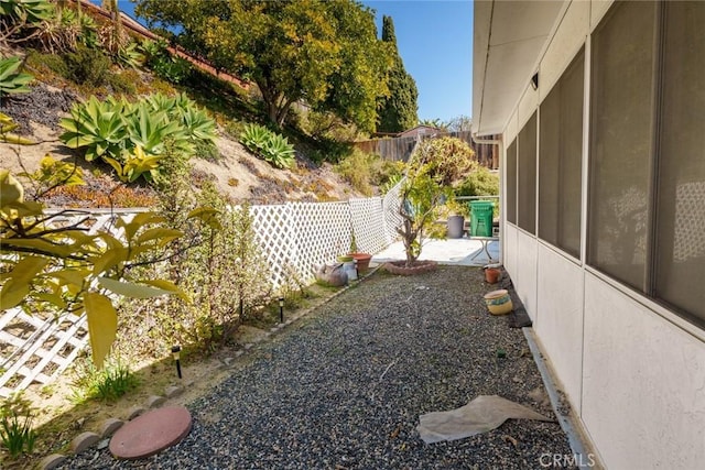 3648 Mira Pacific Dr, Oceanside, CA 92056 - view of yard with a sunroom and fence