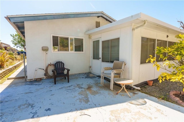 3648 Mira Pacific Dr, Oceanside, CA 92056 - back of house with a patio and stucco siding