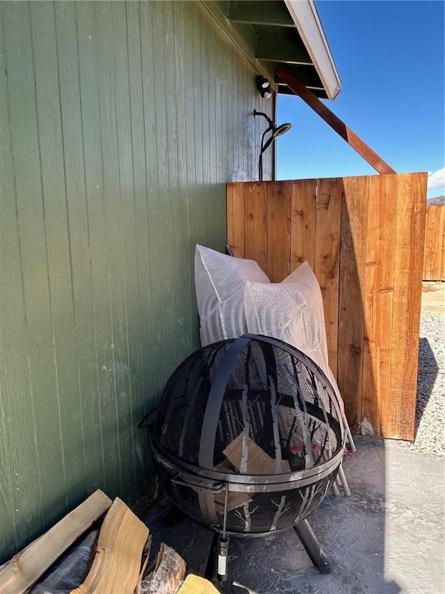 exterior details featuring fence