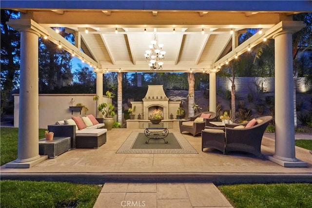 12364 Palmer Dr, Moorpark, CA 93021 - view of patio / terrace with a fenced backyard and an outdoor living space with a fireplace