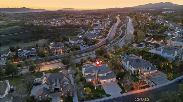 bird's eye view featuring a mountain view and a residential view