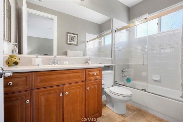 12364 Palmer Dr, Moorpark, CA 93021 - full bathroom with toilet, tile patterned floors, bath / shower combo with glass door, and vanity