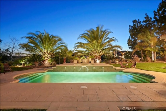 pool with a patio area