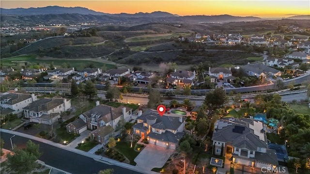 12364 Palmer Dr, Moorpark, CA 93021 - aerial view at dusk with a mountain view and a residential view
