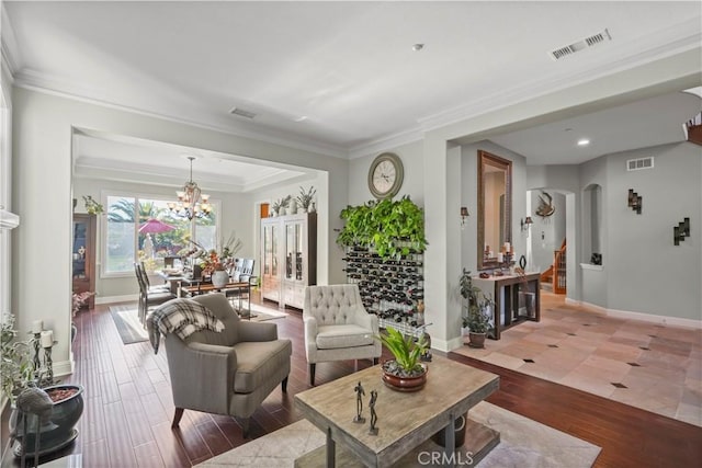 12364 Palmer Dr, Moorpark, CA 93021 - living room featuring visible vents, baseboards, wood finished floors, and a notable chandelier