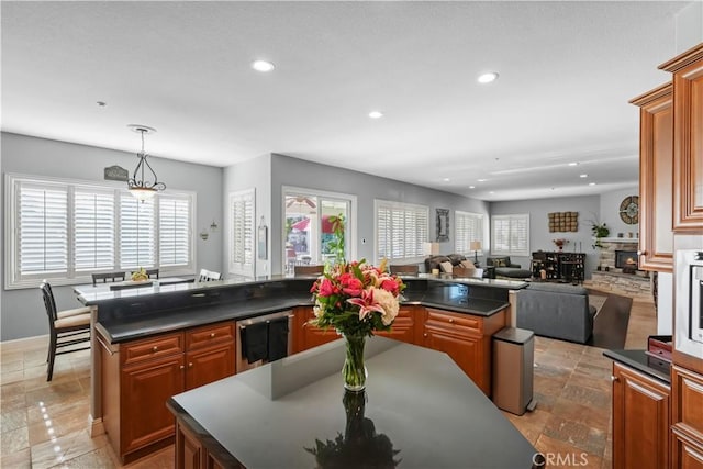 12364 Palmer Dr, Moorpark, CA 93021 - kitchen featuring dark countertops, recessed lighting, and a wealth of natural light