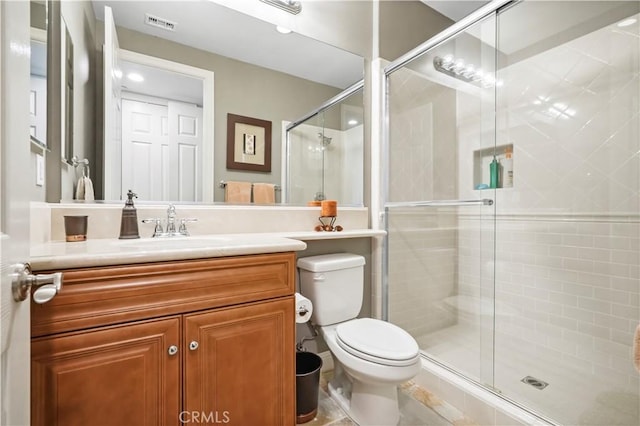 12364 Palmer Dr, Moorpark, CA 93021 - full bathroom with vanity, a shower stall, toilet, and visible vents