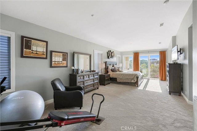 bedroom featuring light carpet, visible vents, baseboards, and access to outside