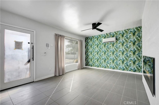 tiled empty room featuring wallpapered walls, baseboards, and a ceiling fan