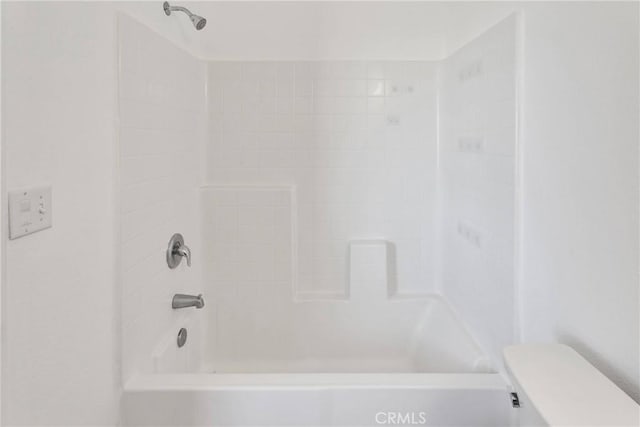 full bath with toilet and bathing tub / shower combination