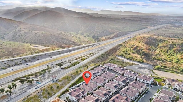 bird's eye view with a residential view and a mountain view