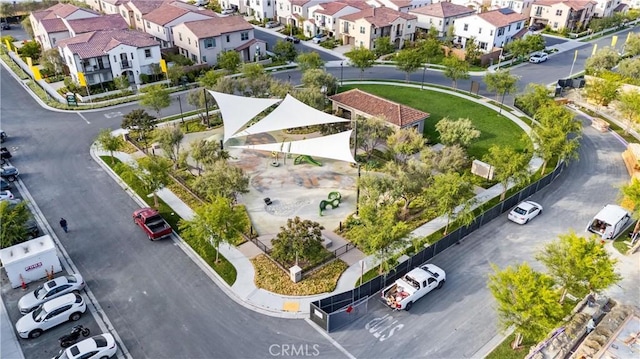 birds eye view of property with a residential view