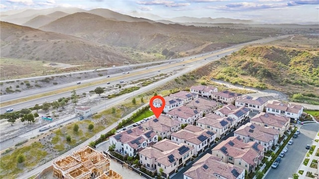 bird's eye view featuring a residential view and a mountain view