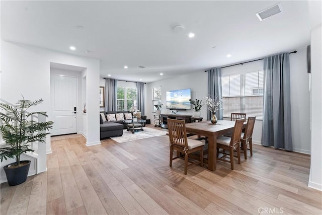 dining area with recessed lighting, visible vents, light wood-style flooring, and baseboards