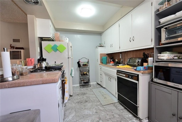 428 N Garfield Ave, Alhambra, CA 91801 - kitchen with tasteful backsplash, visible vents, dishwasher, stainless steel microwave, and gas range oven